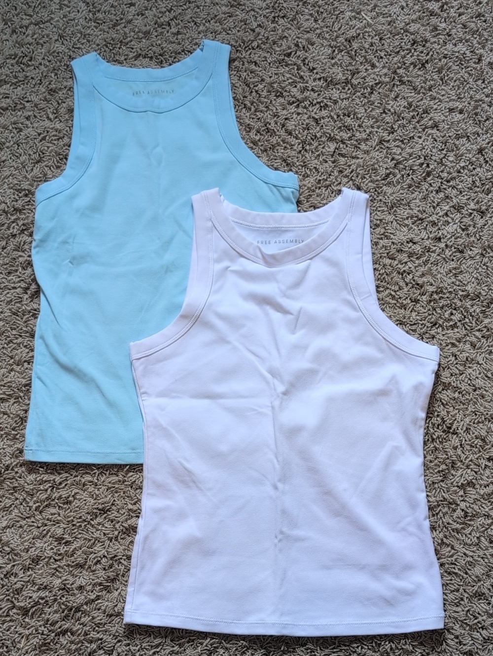 Free Assembly Tank Tops